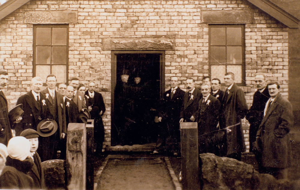Mary and Genevieve Grimshawe in the doorway of Fernilee Methodist Chapel