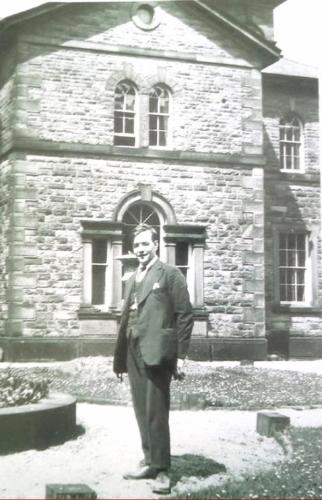 Gent in front of hall